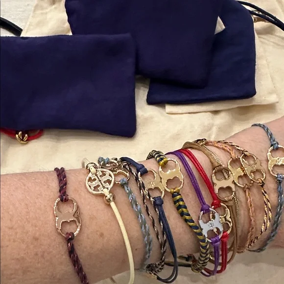 Tory Burch Gold and Multicolor Charm Bracelets - Picture 1 of 1
